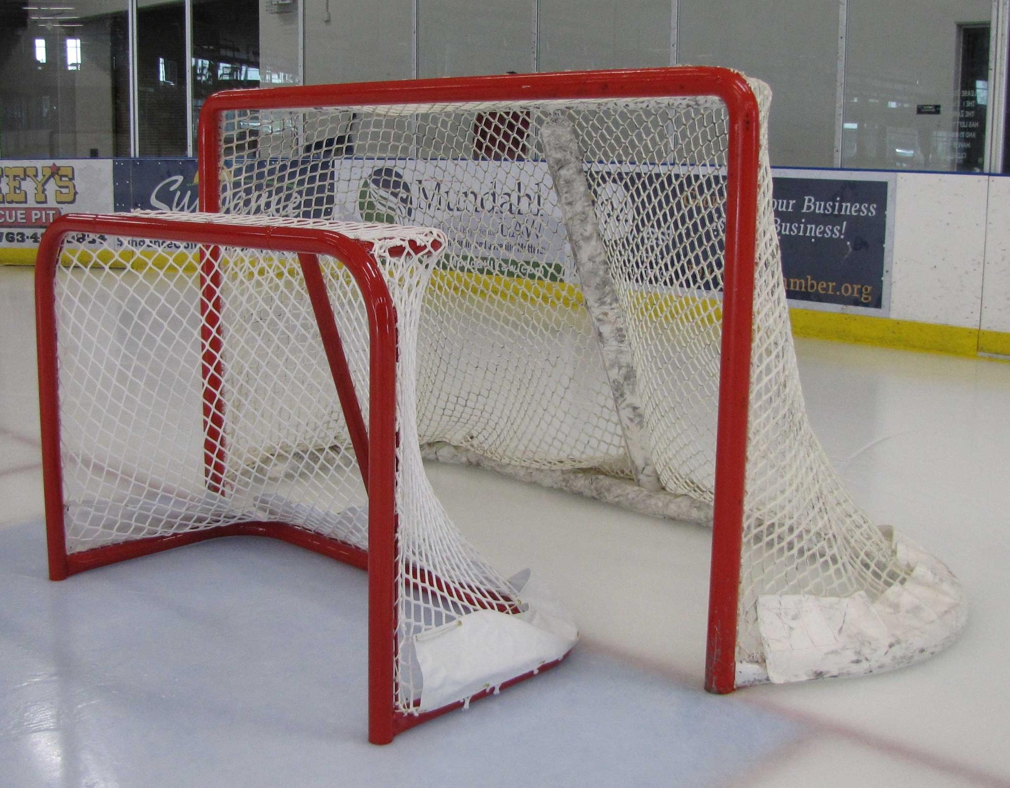 4'6" x 3' Cross-Ice Steel Hockey Goal Frame; 24” Rectangular Base Depth; Welded Lacing Bar for Attaching Net; Red Powder-Coated Finish; Age 8U Players.